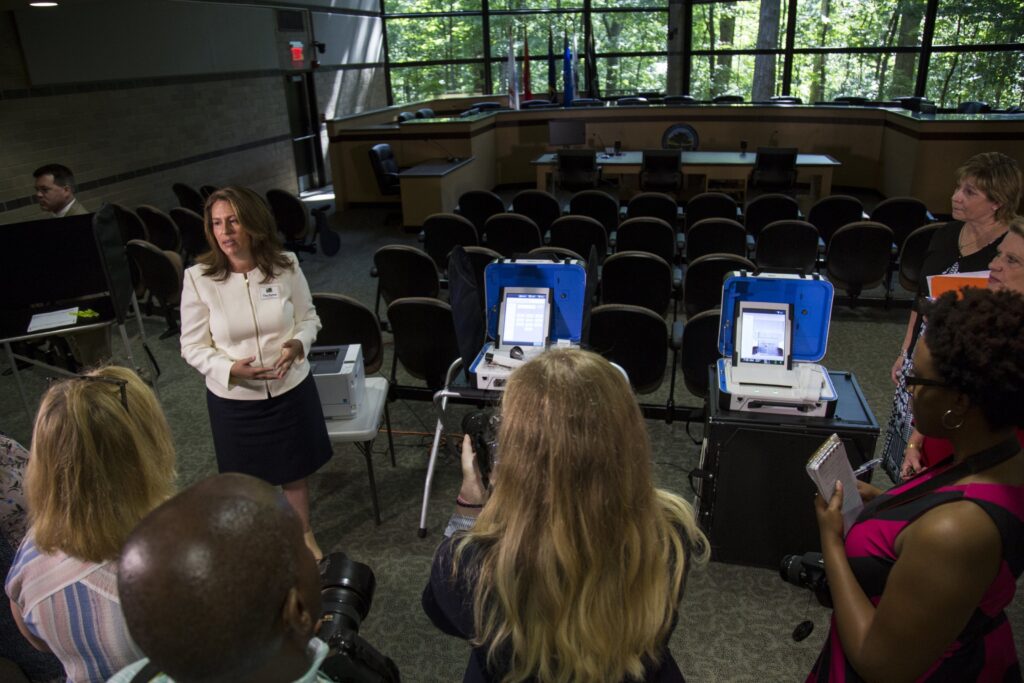 women-election-security-officials-democracy-threat-attack